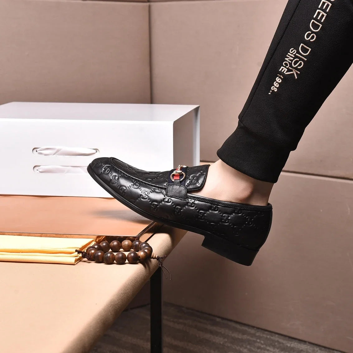 GG Men's Loafer Black Embossed Cowhide 538715
