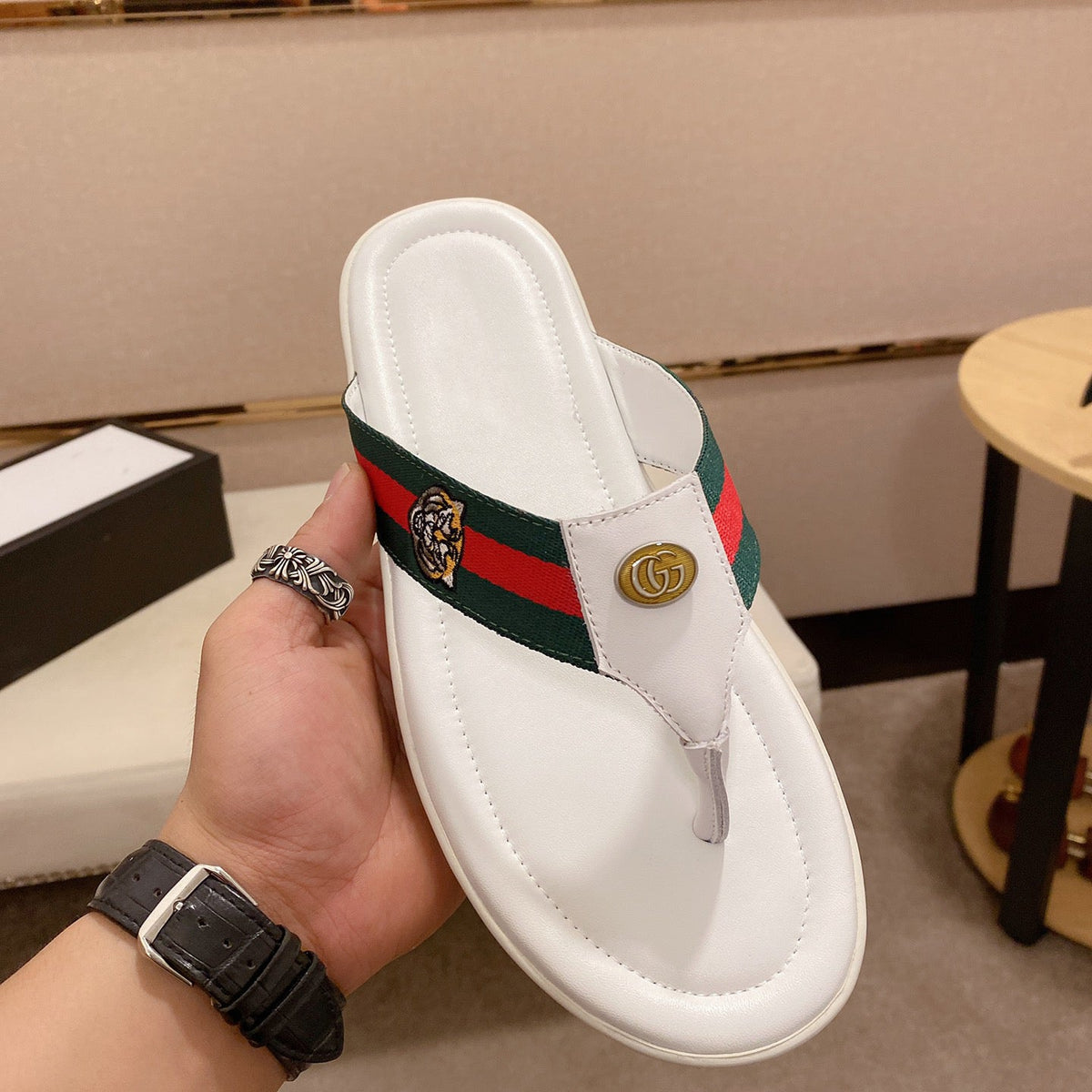 Leather brand flip flops